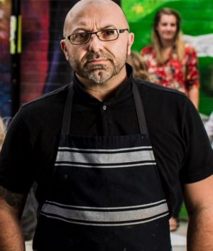 Alex Piris who is the owner of Fox and Bow Cafe, at Farrer, is unhappy about the ACT government asking him to remove the ...