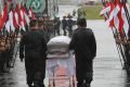 The caskets with the remains of Chapecoense soccer team victims, arrive in Chapeco.