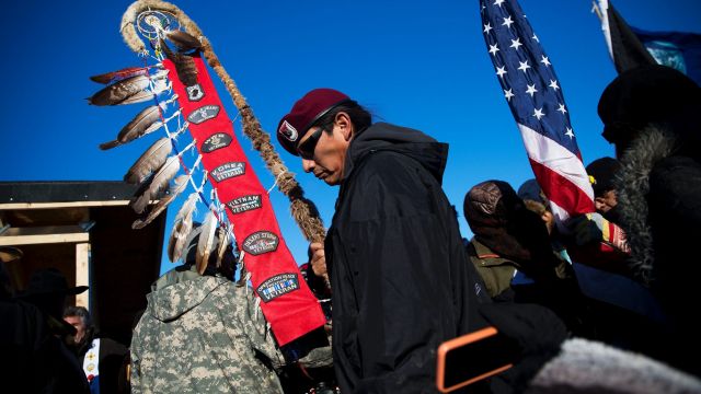 Native American veterans join an interfaith ceremony at the Oceti Sakowin camp where people gathered to protest the ...