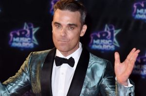 Robbie Williams will be at the ARIAs but not in a singing capacity.