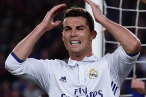 Real Madrid's Cristiano Ronaldo reacts after missing a chance to score during the Spanish La Liga soccer match between ...