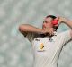 Jon Holland of Victoria bowls during day three of the Sheffield Shield match between Victoria and Tasmania at the ...