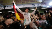 Nico Rosberg celebrates winning the 2016 Formula One world title at the Abu Dhabi Grand Prix