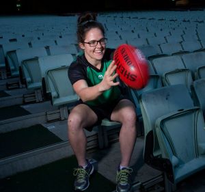 Footballer and cricketer Emma Kearney believes Cricket Australia feels threatened by the AFL.