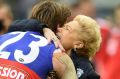 Susan Alberti celebrates the Bulldogs' premiership with with Jordan Roughead.