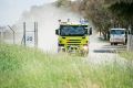 Firefighters at the scene of the Pialligo recycling plant fire last week.