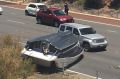 A boat has flipped off its trailer on the Graham Farmer Freeway. 