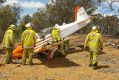 Two passengers have walked away from this light plane crash. 