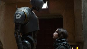 In this image released by Disney, Alan Tudyk portrays K-2SO, left, and Felicity Jones portrays Jyn Erso in a scene from, ...