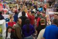 Customer flooding a Walmart store in Rogers, Arkansas, during last year's Black Friday sales. 