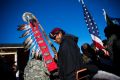 Native American veterans join an interfaith ceremony at the Oceti Sakowin camp where people gathered to protest the ...