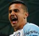 Tim Cahill  celebrates after kicking a goal during the FFA Cup final.