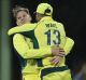 What a catch: Matt Wade embraces Steve Smith after the captain's stunning grab. 