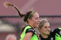 Canberra United celebrate Ellie Brush's goal.