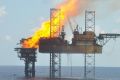 A handout photograph shows a well head platform on fire in the Montara oil field on  November 2, 2009. 