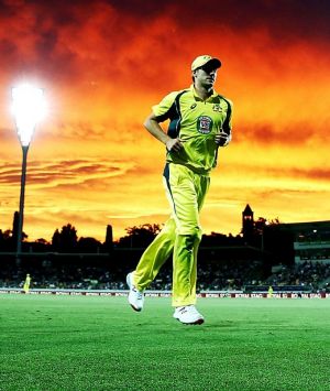 CANBERRA, AUSTRALIA - DECEMBER 06: James Faulkner of Australia fields near the boundary rope as the sun sets during game ...