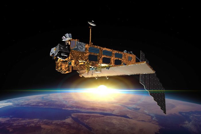 The Sun is emerging from behind the European Space Agency satellite Envisat