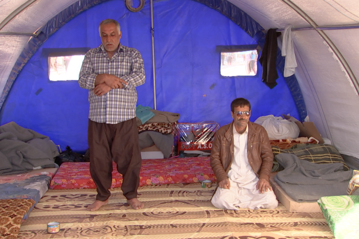 Ahmed is seen praying