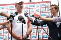 Swans coach John Longmire talks to media at a  pre-season training session.