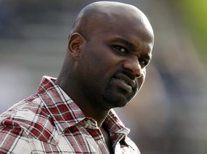 Former Colorado running back and Heisman Trophy winner Rashaan Salaam watches from the sidelines during the third quarter of an NCAA college football game between Colorado and Washinton in Boulder, Colo., on Saturday, Nov. 17, 2012. Washington won 38-3. (AP Photo/David Zalubowski)