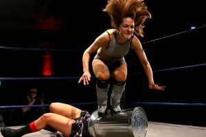 Taking out the trash: Evie stomps on Kellyanne during a Melbourne City Wrestling bout.