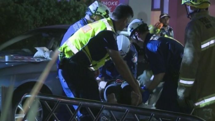 A dramatic rescue in western Sydney ends with a woman being cut from a car