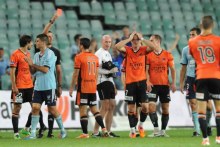 Brisbane Roar's Besart Berisha receives a red card from referee against Sydney FC in March 2014. 