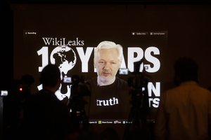 WikiLeaks founder Julian Assange participates via video link at a news conference marking the 10th anniversary of the secrecy-spilling group in Berlin, Germany, Tuesday, Oct. 4, 2016.