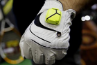 The Zepp Labs Inc. wearable sensor is displayed for a photograph on a golf glove during the CES Unveiled press event ...