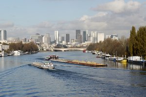 Barges, Paris, France (La Defense district skyline in the background)