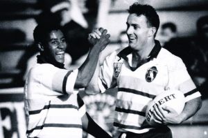 George Gregan and Dave Grimmond congratulate each other after scoring the final try to give the Kookaburras a 22-6 win ...