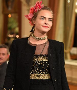 PARIS, FRANCE - DECEMBER 06: Cara Delevingne walks the runway during "Chanel Collection des Metiers d'Art 2016/17 : ...