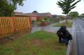 A television cameraman films the scene of the shooting in Walsingham Crescent in Kurunjang.