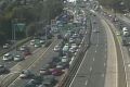 Traffic is queued through the Sydney Harbour Tunnel to the Warringah Freeway.