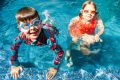 Jasper, 6, and Claudia Hall, 8, of Aranda enjoy the swimming in the pool. Claudia did the compulsory year 2 water safety ...