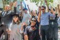 Photo by Finbar O'Mallon. Protest in Canberras Garema place against a proposal by the Southern Cross Clubs Group to cut ...