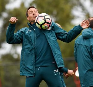 Coach John van 't Schip joins in at Melbourne City training.