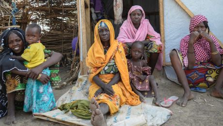 A family at Goni Kachallari in Maiduguri. They are one of 17,700 families in Borno who receive a monthly ration of oil, ...