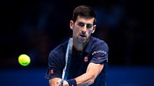 LONDON, ENGLAND - NOVEMBER 15:  Novak Djokovic of Serbia in action during his men's singles match against Milos Raonic ...