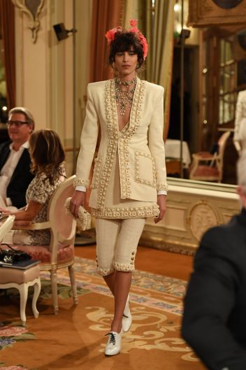 A model walks the runway during "Chanel Collection des Metiers d'Art 2016/17 : Paris Cosmopolite" show in Paris.