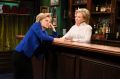 Kate McKinnon, left, portrays Hillary Rodham Clinton, and Hillary Rodham Clinton, right, portrays Val the bartender, ...