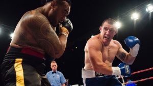 Fight night: Paul Gallen goes toe to toe with Junior Paulo at Moore Park.