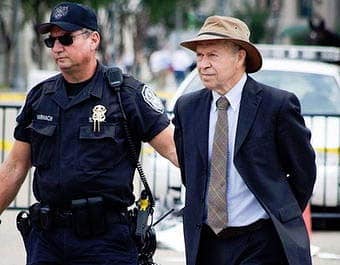 James Hansen being arrested at a protest against the Keystone XL pipeline, which he calls "the fuse to the biggest carbon bomb on the planet," because it would carry tar sands crude. 