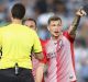 Michael Jakobsen of Melbourne City makes his point to referee Kris Griffith-Jones.