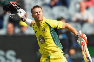 Prolific: David Warner celebrates his century at the MCG.