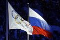 The Russian and Olympic flags fly at the Sochi winter Olympics, where medallists were involved in doping.