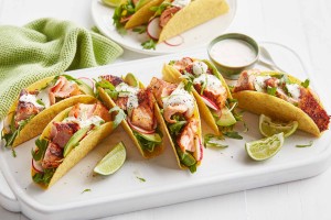 Speedy salmon tacos with lime cream