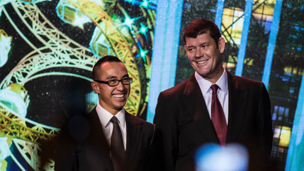 Billionaire Lawrence Ho and James Packer before the opening of Melco's Studio City casino resort in Macau.