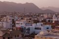 In the Indian city of Udaipur, flat roofs become places for living, yoga, laundry.