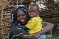 A family at Goni Kachallari in Maiduguri. They are one of 17,700 families in Borno who receive a monthly ration of oil, ...